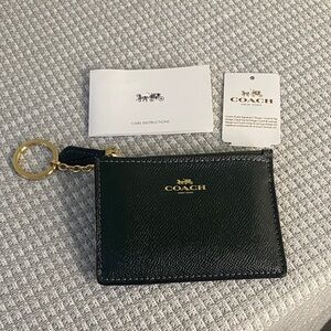 Coach Black Leather Pouch with Gold Accents
